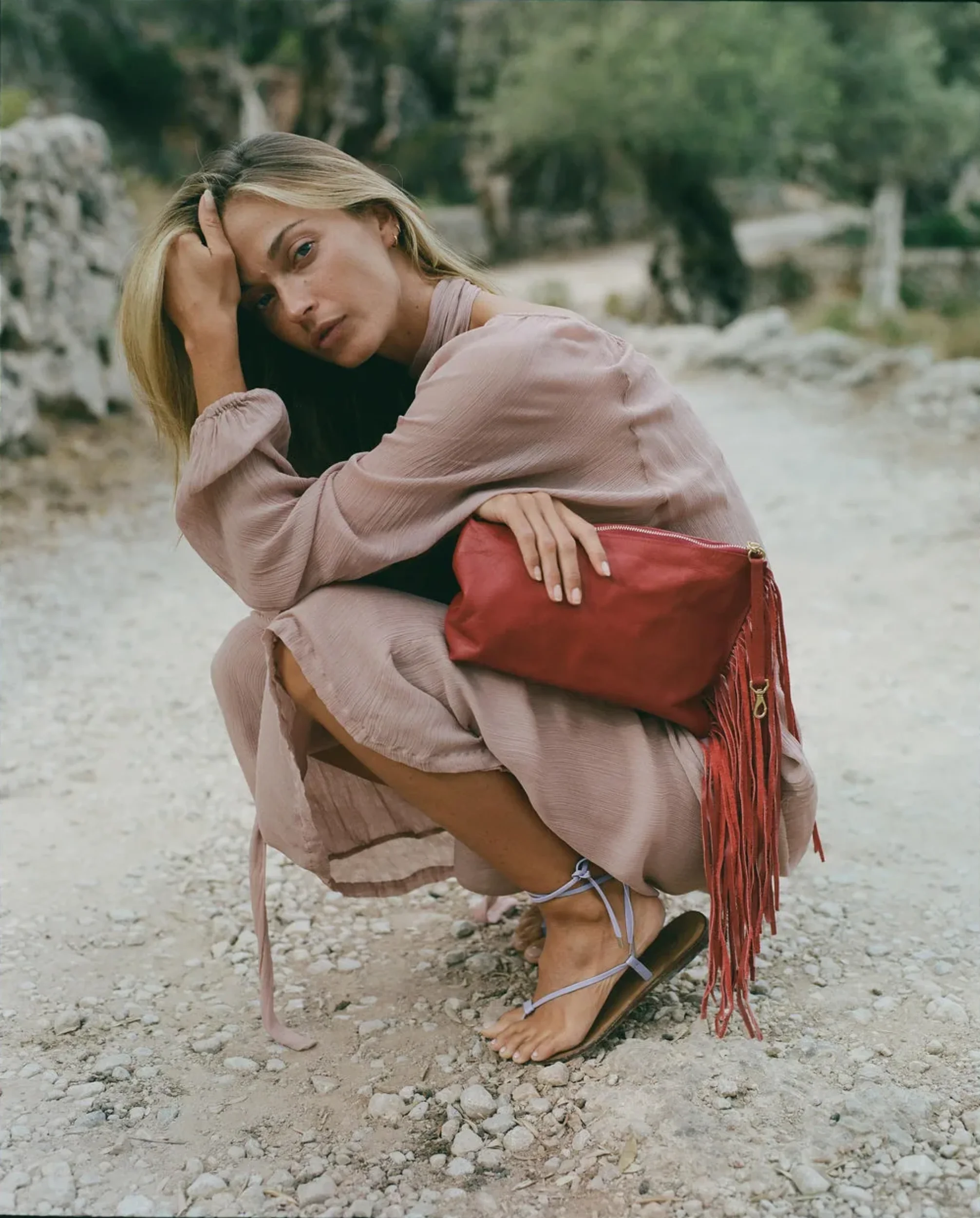 Selva Fringe red leather top handle bag